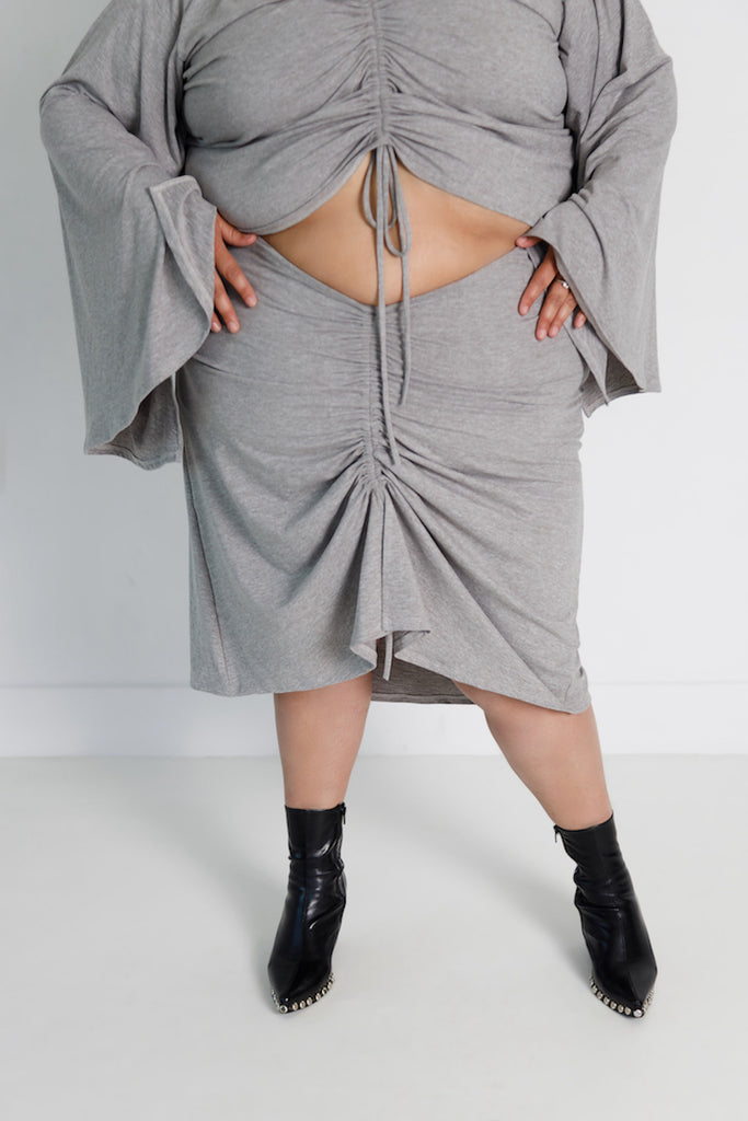 Gray dipped skirt with exaggerated belle sleeve shirt 